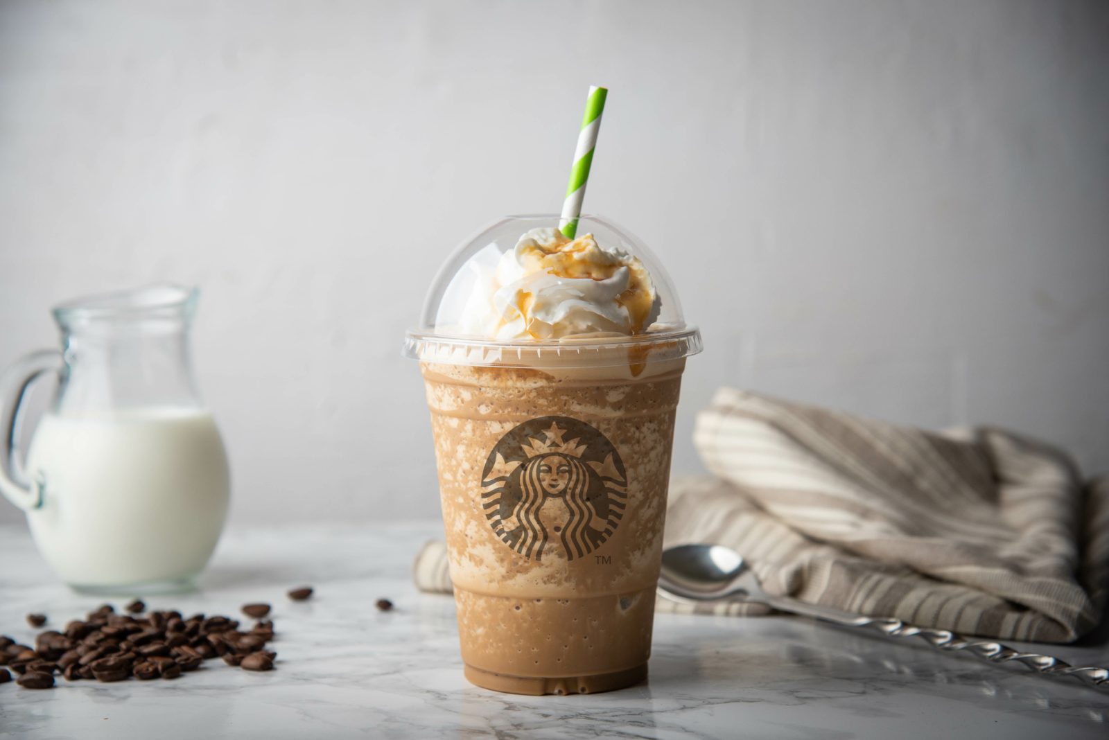 Starbucks Caramel Rrappuccino with whipped cream