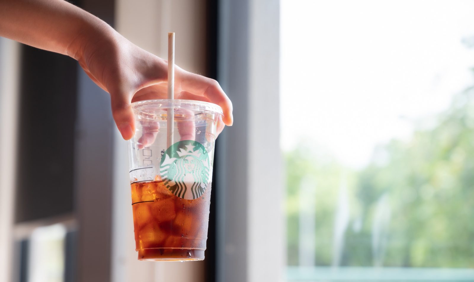 Cold Brew coffee in Starbucks coffee shop. Cold brewing is a method of brewing that combines ground coffee and cool water.